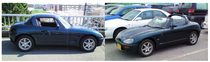 並んで停められた濃紺と黒の軽スポーツカー2台